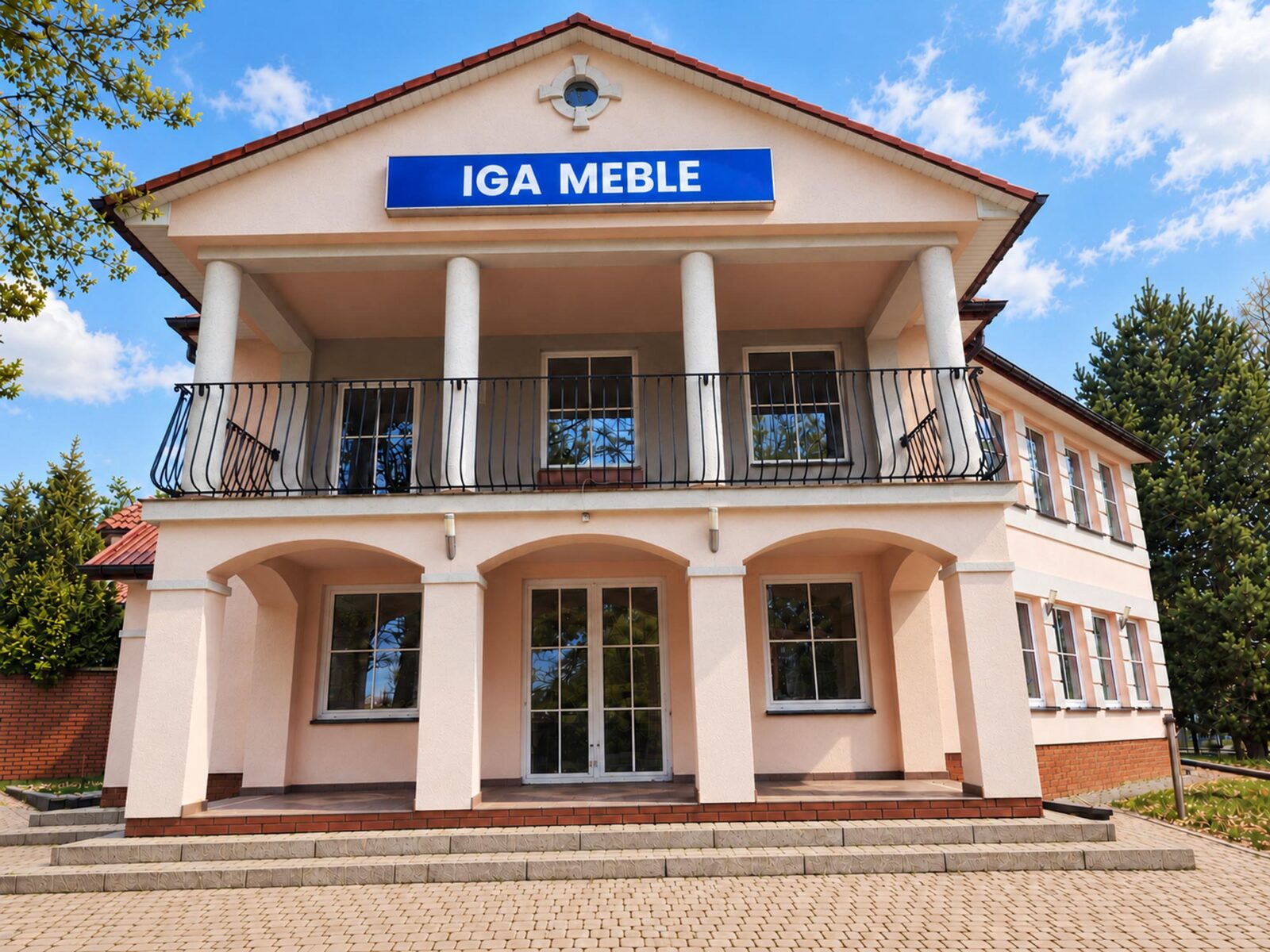 Budynek sklepu IGA Meble w Leżajsku przy ul. Sandomierskiej 4A z szyldem IGA MEBLE