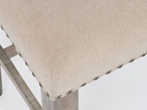 Miniaturka 5 - Zestaw barowy Avola detal beżowej tapicerki i metalowych ćwieków hokera