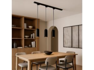Miniaturka 2 - Trzy czarne lampy szynowe z cylindrycznym kloszem nad stołem